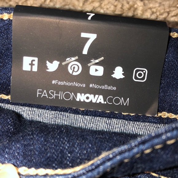 High Rise Distressed Jeans - Picture 5 of 9